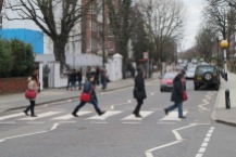 Walking on the famous pedestrian - Abbey Road.